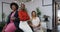 Portrait of three diverse female office colleagues smiling at office