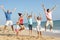 Portrait Of Three Generation Family On Beach