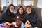 Portrait of three Iranian schoolgirls on board ship, southern Ir