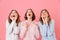 Portrait of three joyful young girls 20s wearing colorful stripe