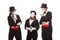 Portrait of three mime artists performing, isolated on white background. Mimes stand thinking. Symbol of finding