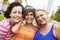 Portrait Of Three Senior Female Friends In Park