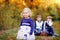 Portrait of three siblings children. Little cute toddler sister girl and Two kids brothers boys on background having fun