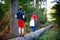 Portrait of three siblings children. Little cute toddler sister girl and Two kids brothers boys having fun together in