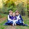 Portrait of three siblings children. Two kids brothers boys and little cute toddler sister girl having fun together in