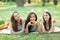 Portrait of three young women showing sign peace and heart