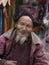 Portrait tibetan old man on the street in Leh, Ladakh. India