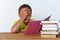 Portrait of tween boy reading a book