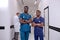 Portrait Of Two Afro American Guys In Blue Medical Suit Posing Confidently