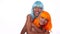 Portrait of two beautiful happy Asian women friends in bright blue and orange wig posing over white