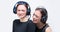 Portrait of two beautiful women with headsets. Technical support concept