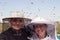 Portrait of two beekeeper surrounded by bees