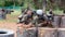 Portrait of two confident male paintball players in masks