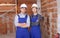 Portrait of two confident workers