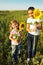 Portrait of two cute litle girls with sunflowers
