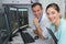 Portrait two doctors smiling in monitoring room in hospital