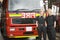 Portrait of two female firefighters standing