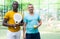 Portrait of two men padel tennis players