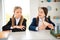 Portrait of two person nice attractive charming cute cheerful funny girls having lunch pause break breakfast want wish