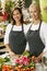 Portrait Of Two Sales Assistants In Florists Shop