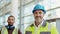 Portrait of two smiling construction workers