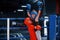 Portrait of two young boys in protective gloves celebrating victory on boxing ring