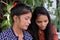 Portrait of two young Indian females taking a selfie