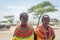 Portrait of two young maasai girls with traditional jewelery