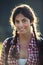 Portrait of Tyrolean girl in mountain clothing