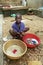 Portrait of Ugandan boy washing clothes