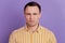 Portrait of upset disgusted guy grimace look camera frowning on purple background