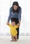 Portrait in vertical asian mom are leader hand with baby child walking both of them smile and look happy with look at camera with