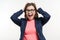 Portrait of very happy surprised adult business woman holding her head in amazement. White Background Studio