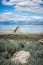 Portrait view of Antelope Island State Park road leading over Bridger Bay in Utah