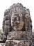 Portrait view of faces carved in stone at Bayon Temple in the Khmer temple complex of Angkor