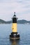 Portrait view of lighthouse, floating in the ocean in Busan, South Korea