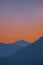 Portrait view over valley Ennstal to sunset over mountain Gumpeneck