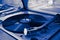 Portrait of a vintage turntable in blue tones. Record store day.