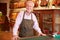 Portrait Of Violin Maker In Shop