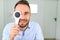 Portrait, vision and spoon with a man patient at the optometrist for an eye exam testing his depth perception