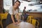 Portrait of waitress cleaning table