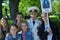 Portrait of war veteran surrounded by several generations of people