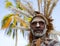 Portrait of a Warrior Asmat tribe in traditional headdress.