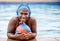 Portrait, water polo or happy black woman in swimming pool for exercise, workout or practice in sports fitness. Relax