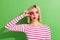 Portrait of wearing top young girl red lips kiss joke face headshot charming lady hiding strawberry  on green