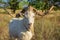 Portrait of white goat with abnormally enormous horns