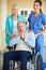 Portrait of wife, caregiver or old man in wheelchair in hospital clinic helping an elderly patient for support. Happy