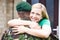 Portrait Of Wife Hugging Army Husband Home On Leave