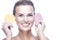 Portrait of Winsome Young Girl with Fresh Clean Skin for Health Facial Therapy Posing With Two Cleaning Sponges Against Pure White