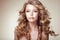 Portrait of Woman with Beautiful Flowing Bronzed Frizzy Hair